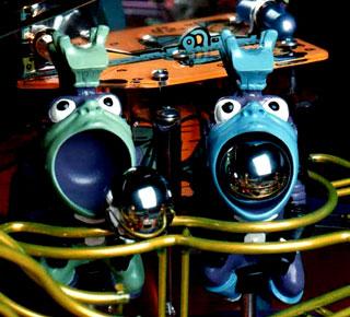 "The two creatures that volunteered as ball locks for 'Looped In Space' multiball. Photo courtesy of Capcom Pinball."
Photo by: Capcom Coin-Up Inc.